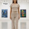 Chic Grommet Detail Two-Piece Set with Flared Pants