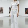 Chic Grommet Detail Two-Piece Set with Flared Pants