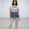 Chic Denim-Patch Graphic Tee and Flare Pants Set