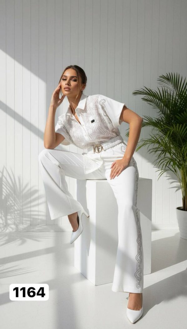 Embroidered Peplum Top & Flare Pant Ensemble